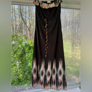 dc-Dolce Vita Strapless maxi dress w/chest ruffle, side pockets and adj. waist.